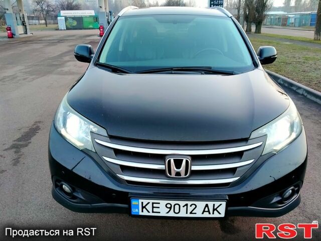 Чорний Хонда СРВ, об'ємом двигуна 24 л та пробігом 130 тис. км за 16500 $, фото 1 на Automoto.ua