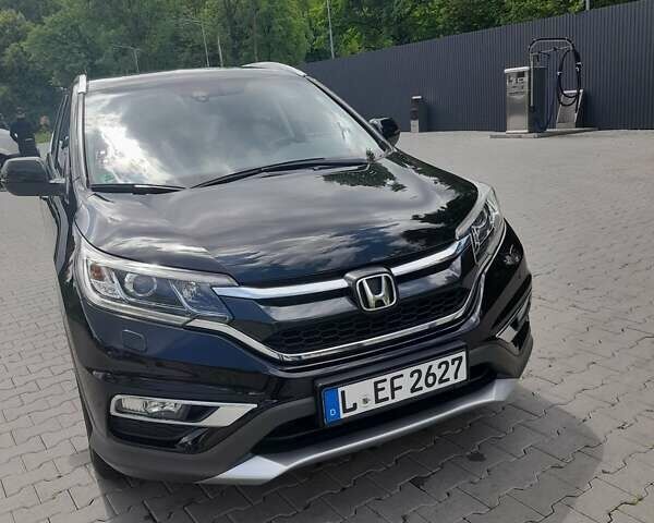 Черный Хонда СРВ, объемом двигателя 1.6 л и пробегом 277 тыс. км за 16490 $, фото 1 на Automoto.ua