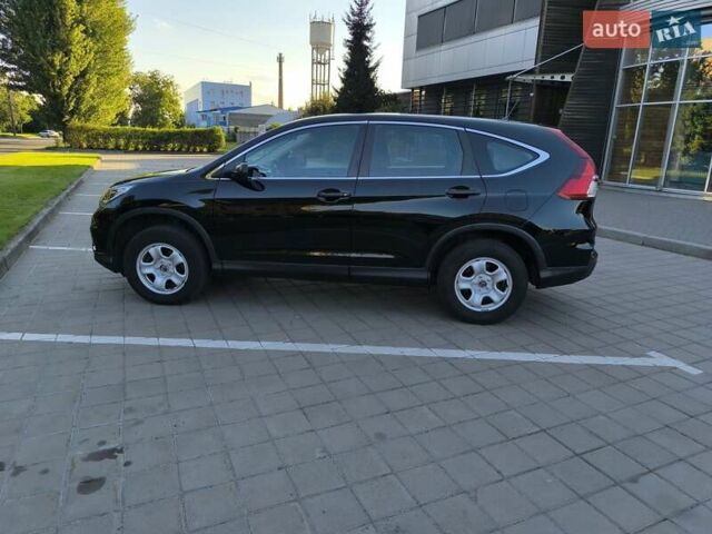 Черный Хонда СРВ, объемом двигателя 2.35 л и пробегом 126 тыс. км за 16200 $, фото 1 на Automoto.ua
