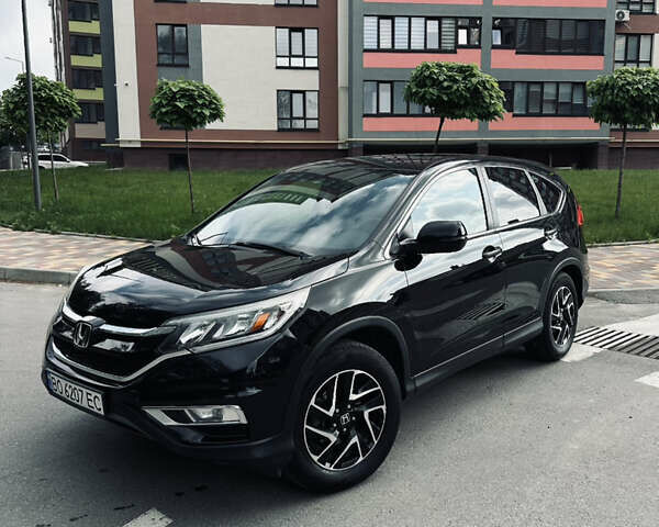 Черный Хонда СРВ, объемом двигателя 2.36 л и пробегом 160 тыс. км за 14500 $, фото 1 на Automoto.ua