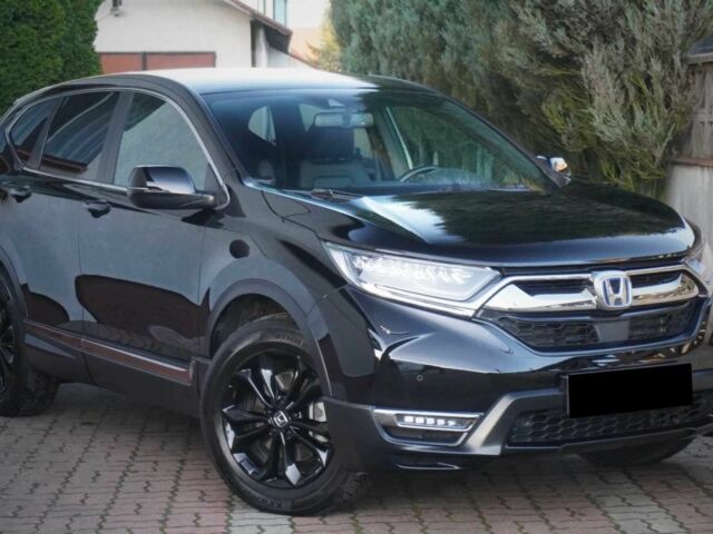 Черный Хонда СРВ, объемом двигателя 2 л и пробегом 55 тыс. км за 16000 $, фото 1 на Automoto.ua