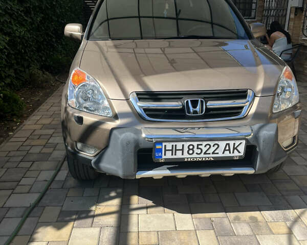 Коричневый Хонда СРВ, объемом двигателя 2 л и пробегом 345 тыс. км за 6200 $, фото 1 на Automoto.ua