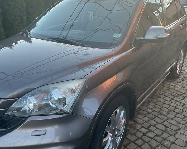 Коричневый Хонда СРВ, объемом двигателя 2.2 л и пробегом 228 тыс. км за 14200 $, фото 1 на Automoto.ua