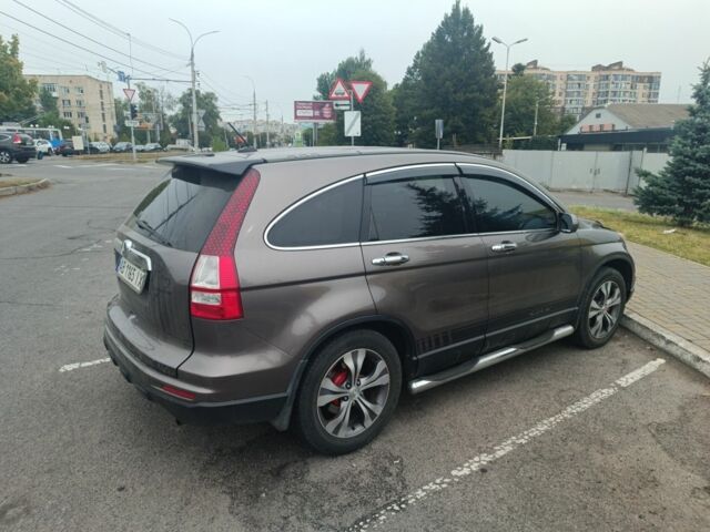 Коричневый Хонда СРВ, объемом двигателя 2.4 л и пробегом 330 тыс. км за 10300 $, фото 1 на Automoto.ua