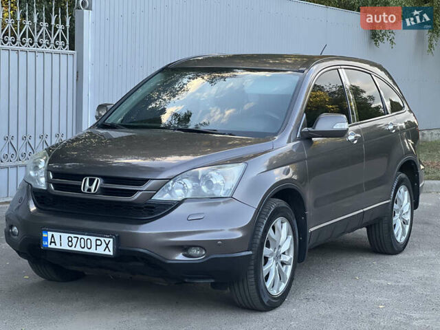 Коричневый Хонда СРВ, объемом двигателя 2.35 л и пробегом 201 тыс. км за 14700 $, фото 1 на Automoto.ua