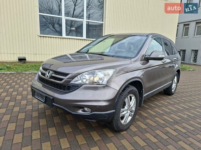Коричневый Хонда СРВ, объемом двигателя 2.2 л и пробегом 167 тыс. км за 15400 $, фото 1 на Automoto.ua