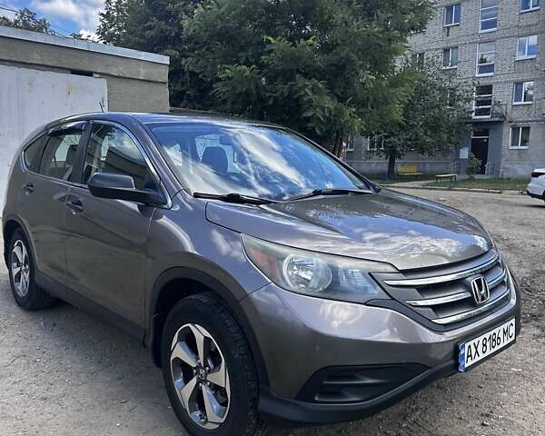 Коричневый Хонда СРВ, объемом двигателя 2.35 л и пробегом 210 тыс. км за 12400 $, фото 1 на Automoto.ua