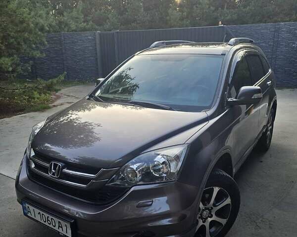 Коричневый Хонда СРВ, объемом двигателя 2.4 л и пробегом 200 тыс. км за 14300 $, фото 1 на Automoto.ua