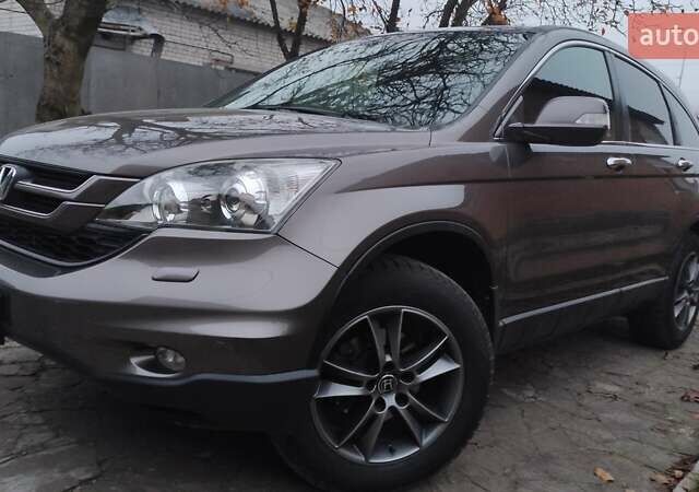 Коричневый Хонда СРВ, объемом двигателя 2.2 л и пробегом 232 тыс. км за 14700 $, фото 1 на Automoto.ua