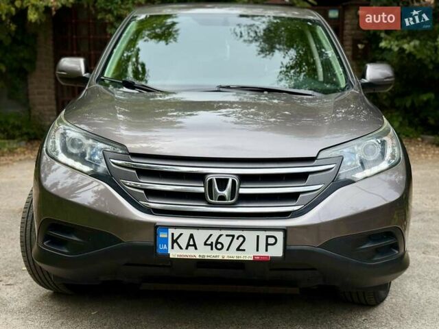 Коричневий Хонда СРВ, об'ємом двигуна 2.35 л та пробігом 216 тис. км за 15700 $, фото 1 на Automoto.ua