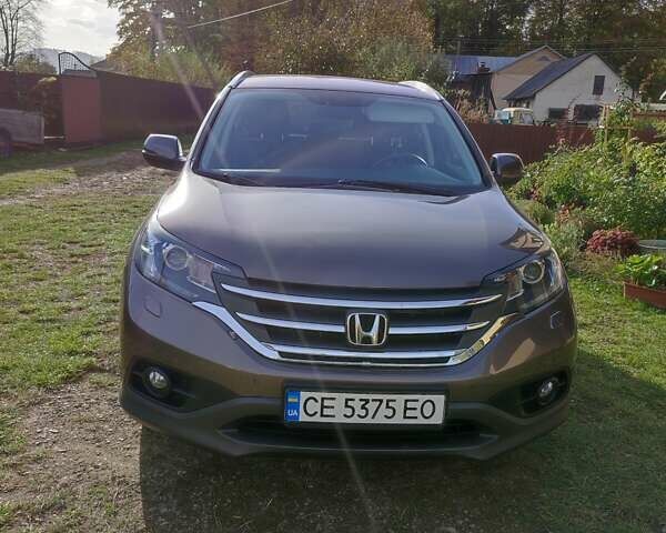 Коричневый Хонда СРВ, объемом двигателя 2 л и пробегом 202 тыс. км за 17600 $, фото 1 на Automoto.ua