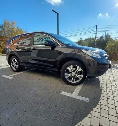 Хонда СРВ 2013 у Вінниці на Automoto.ua Коричневий Хонда СРВ, об'ємом двигуна 2.35 л та пробігом 164 тис. км за 17999 $, фото 1 на Automoto.ua