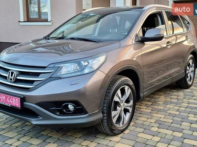 Коричневый Хонда СРВ, объемом двигателя 1.6 л и пробегом 230 тыс. км за 14900 $, фото 1 на Automoto.ua