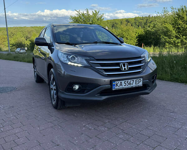 Коричневый Хонда СРВ, объемом двигателя 2 л и пробегом 221 тыс. км за 16500 $, фото 1 на Automoto.ua