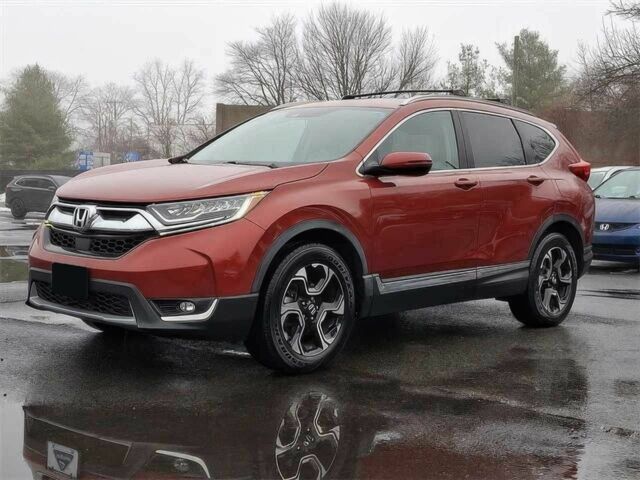 Красный Хонда СРВ, объемом двигателя 1.5 л и пробегом 68 тыс. км за 7800 $, фото 1 на Automoto.ua