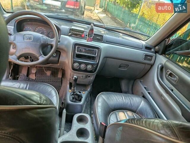 Красный Хонда СРВ, объемом двигателя 2 л и пробегом 419 тыс. км за 5000 $, фото 1 на Automoto.ua