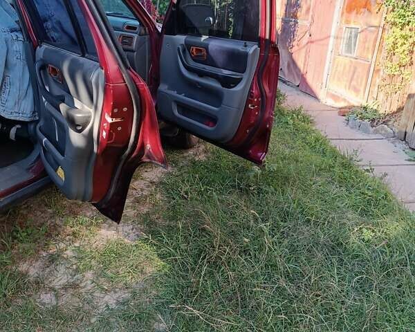 Червоний Хонда СРВ, об'ємом двигуна 2 л та пробігом 300 тис. км за 3900 $, фото 1 на Automoto.ua