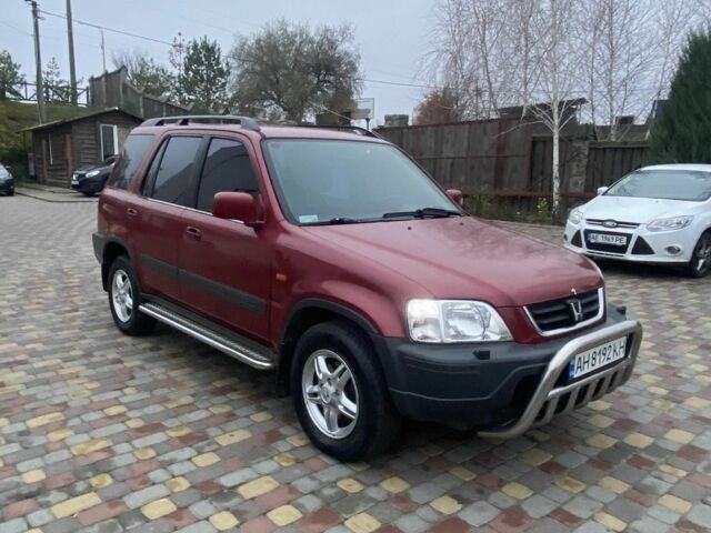 Красный Хонда СРВ, объемом двигателя 2 л и пробегом 217 тыс. км за 5100 $, фото 1 на Automoto.ua