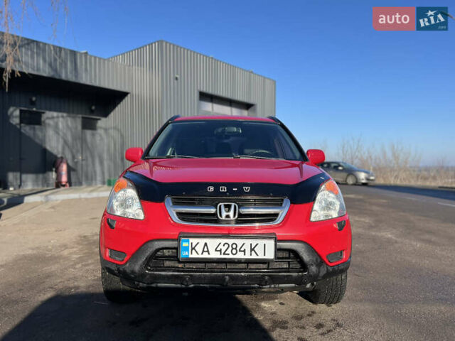 Красный Хонда СРВ, объемом двигателя 2 л и пробегом 408 тыс. км за 6500 $, фото 1 на Automoto.ua
