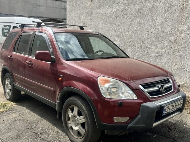Красный Хонда СРВ, объемом двигателя 2 л и пробегом 280 тыс. км за 7500 $, фото 1 на Automoto.ua