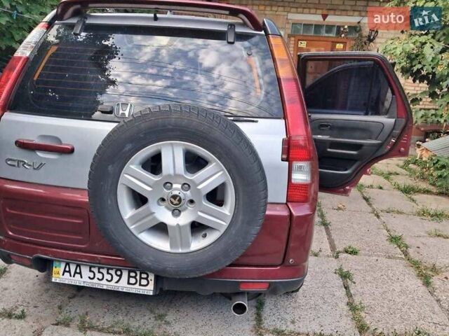 Червоний Хонда СРВ, об'ємом двигуна 2 л та пробігом 275 тис. км за 4950 $, фото 1 на Automoto.ua