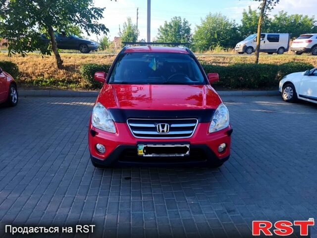 Красный Хонда СРВ, объемом двигателя 2 л и пробегом 225 тыс. км за 7450 $, фото 1 на Automoto.ua
