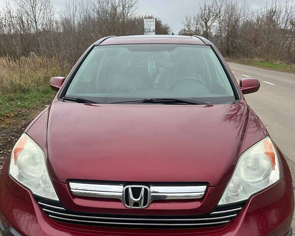 Червоний Хонда СРВ, об'ємом двигуна 2.4 л та пробігом 243 тис. км за 12000 $, фото 1 на Automoto.ua