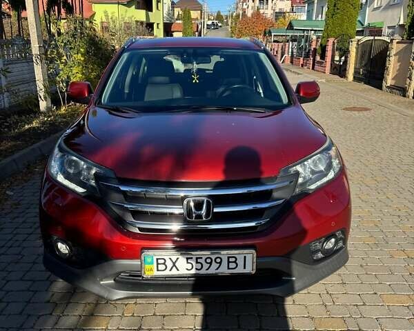 Красный Хонда СРВ, объемом двигателя 2 л и пробегом 153 тыс. км за 14300 $, фото 1 на Automoto.ua