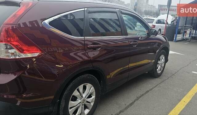 Красный Хонда СРВ, объемом двигателя 2.36 л и пробегом 158 тыс. км за 15600 $, фото 1 на Automoto.ua