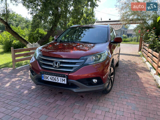 Червоний Хонда СРВ, об'ємом двигуна 2.2 л та пробігом 245 тис. км за 16950 $, фото 1 на Automoto.ua