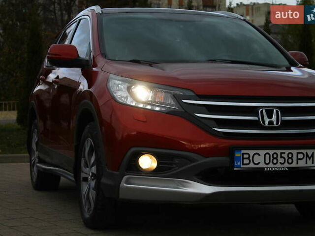 Красный Хонда СРВ, объемом двигателя 2.2 л и пробегом 183 тыс. км за 18200 $, фото 1 на Automoto.ua