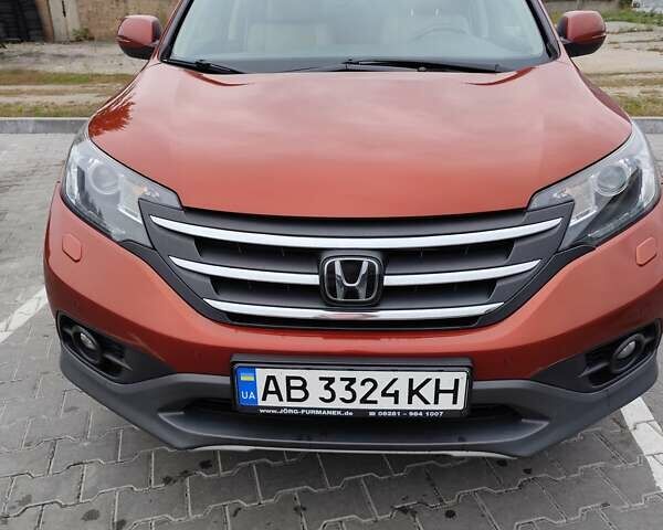 Червоний Хонда СРВ, об'ємом двигуна 2.2 л та пробігом 147 тис. км за 22000 $, фото 1 на Automoto.ua