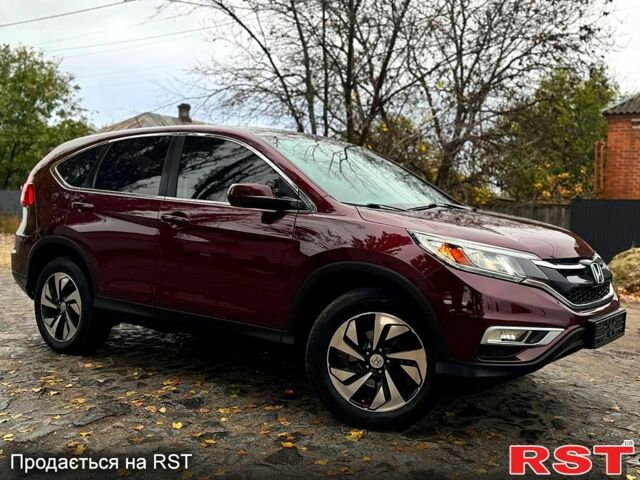 Красный Хонда СРВ, объемом двигателя 2.4 л и пробегом 128 тыс. км за 16550 $, фото 1 на Automoto.ua