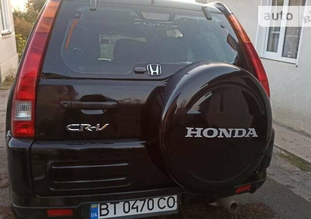 Хонда СРВ, объемом двигателя 2 л и пробегом 300 тыс. км за 7200 $, фото 1 на Automoto.ua
