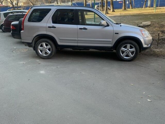 Серый Хонда СРВ, объемом двигателя 2 л и пробегом 200 тыс. км за 6400 $, фото 1 на Automoto.ua