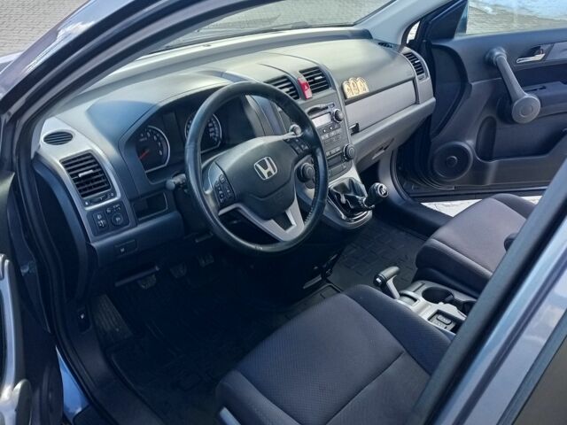 Серый Хонда СРВ, объемом двигателя 2 л и пробегом 225 тыс. км за 10500 $, фото 1 на Automoto.ua