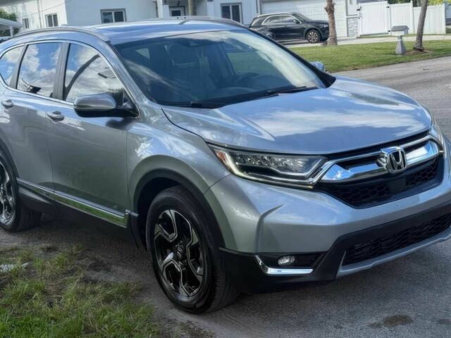 Серый Хонда СРВ, объемом двигателя 1.5 л и пробегом 69 тыс. км за 14000 $, фото 1 на Automoto.ua