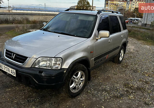 Серый Хонда СРВ, объемом двигателя 2 л и пробегом 312 тыс. км за 5000 $, фото 1 на Automoto.ua