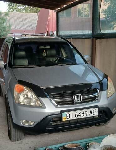 Сірий Хонда СРВ, об'ємом двигуна 2 л та пробігом 230 тис. км за 7600 $, фото 1 на Automoto.ua