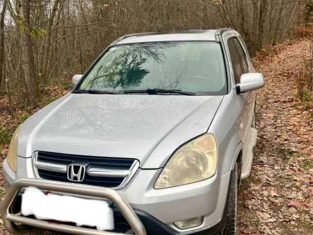 Серый Хонда СРВ, объемом двигателя 2 л и пробегом 320 тыс. км за 2364 $, фото 1 на Automoto.ua