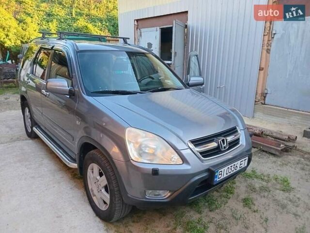 Серый Хонда СРВ, объемом двигателя 2 л и пробегом 300 тыс. км за 8500 $, фото 1 на Automoto.ua