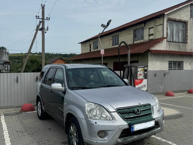 Серый Хонда СРВ, объемом двигателя 2.2 л и пробегом 310 тыс. км за 2500 $, фото 1 на Automoto.ua