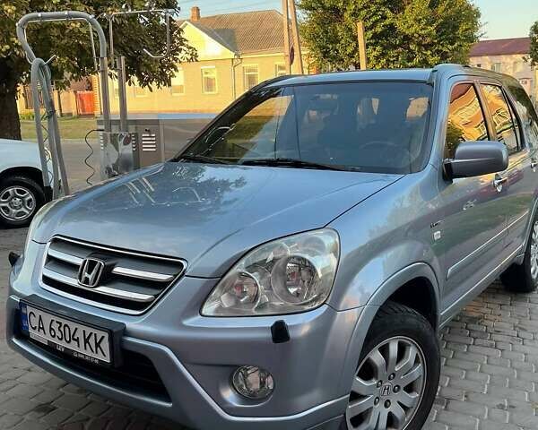 Серый Хонда СРВ, объемом двигателя 2 л и пробегом 251 тыс. км за 7500 $, фото 1 на Automoto.ua