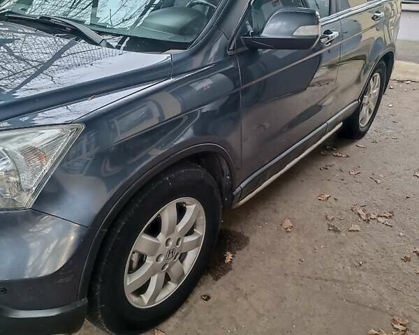 Серый Хонда СРВ, объемом двигателя 2 л и пробегом 270 тыс. км за 8850 $, фото 1 на Automoto.ua