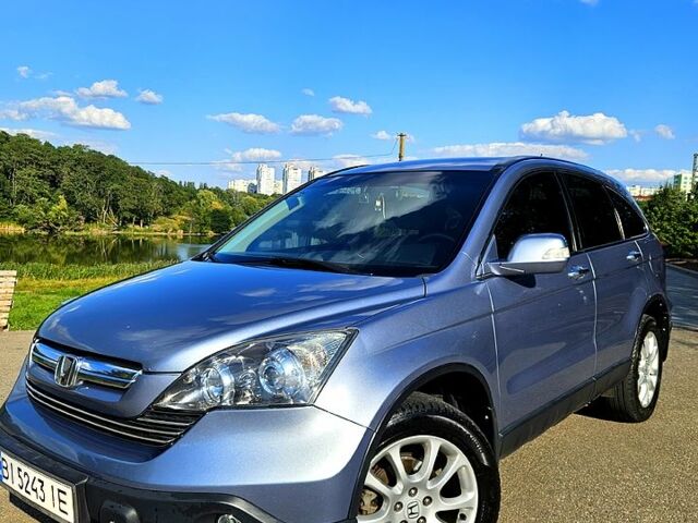 Серый Хонда СРВ, объемом двигателя 2.3 л и пробегом 241 тыс. км за 10850 $, фото 1 на Automoto.ua