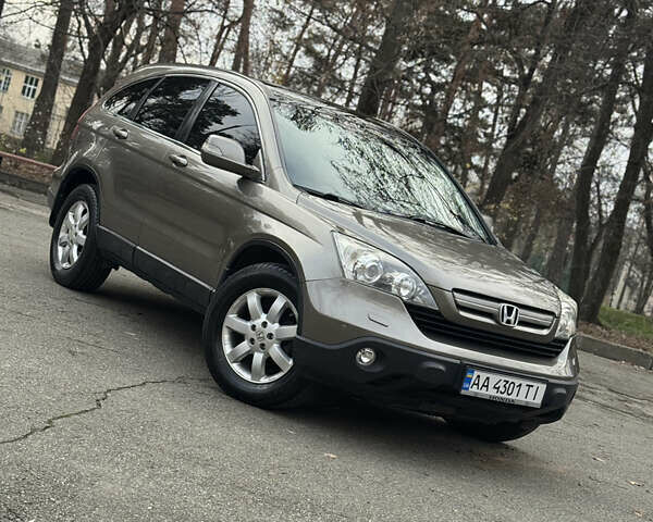 Серый Хонда СРВ, объемом двигателя 2.35 л и пробегом 200 тыс. км за 9999 $, фото 1 на Automoto.ua