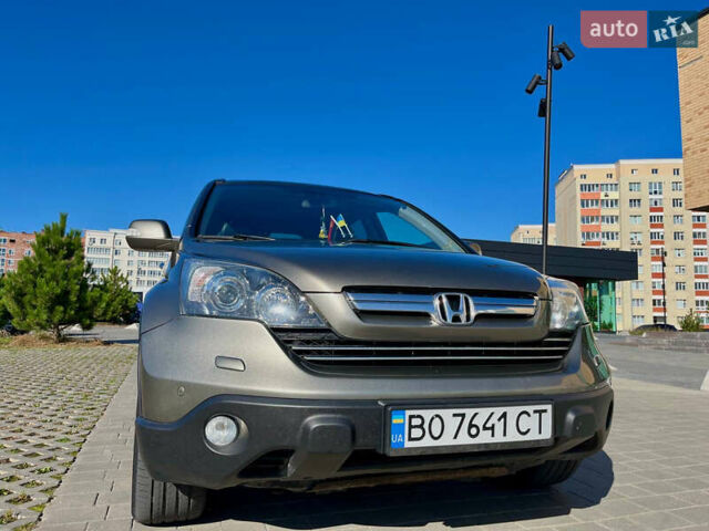 Серый Хонда СРВ, объемом двигателя 2.35 л и пробегом 297 тыс. км за 10200 $, фото 1 на Automoto.ua