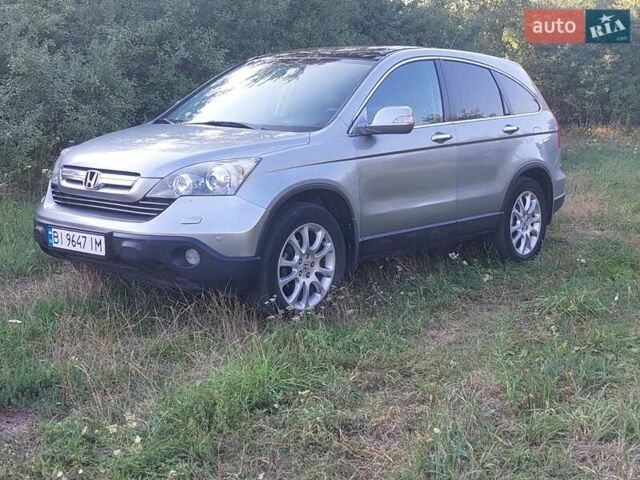 Серый Хонда СРВ, объемом двигателя 2.35 л и пробегом 221 тыс. км за 11000 $, фото 1 на Automoto.ua