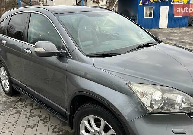 Серый Хонда СРВ, объемом двигателя 2.4 л и пробегом 225 тыс. км за 10900 $, фото 1 на Automoto.ua