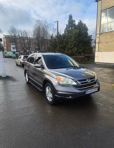 Серый Хонда СРВ, объемом двигателя 2.36 л и пробегом 187 тыс. км за 11900 $, фото 1 на Automoto.ua